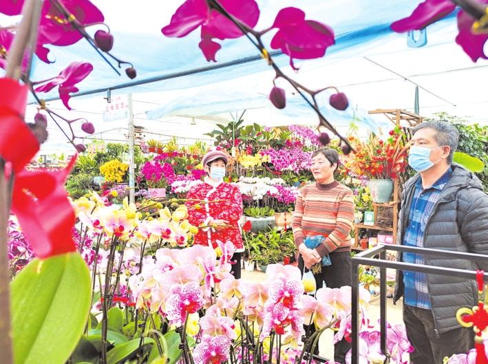 “新闻眼”摄影大赛丨买鲜花 迎新年